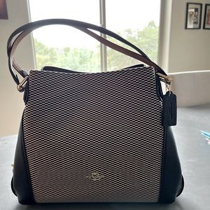 Coach purse, tan and black. 13 x 11 x 4. NWT.